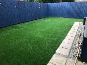 Artificial grass area in Exeter back garden by Alpyne Grass